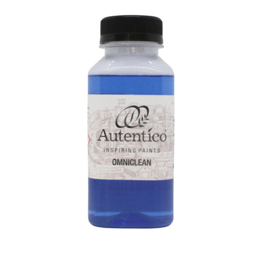 A bottle of Autentico Inspiring Paints 'Omniclean' liquid cleaner with a black cap and a white label, showing blue liquid inside, on a white background.